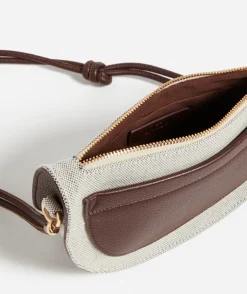 CORY CURVE SLING BAG