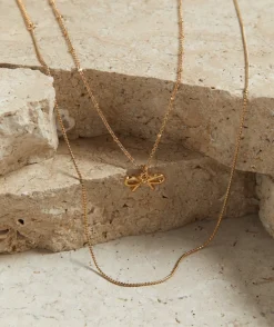 GOLD PLATED BOW PENDANT NECKLACE
