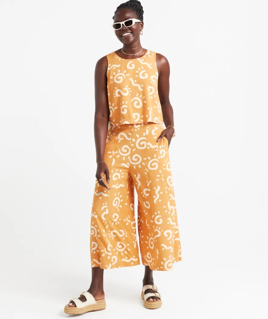 MIA SLEEVELESS BUTTON BACK TOP